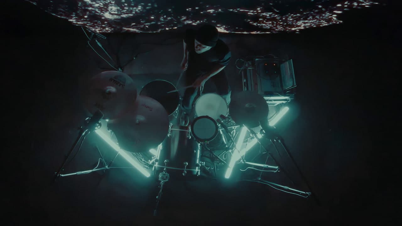 A photo of Khompa at his kit framed from above
