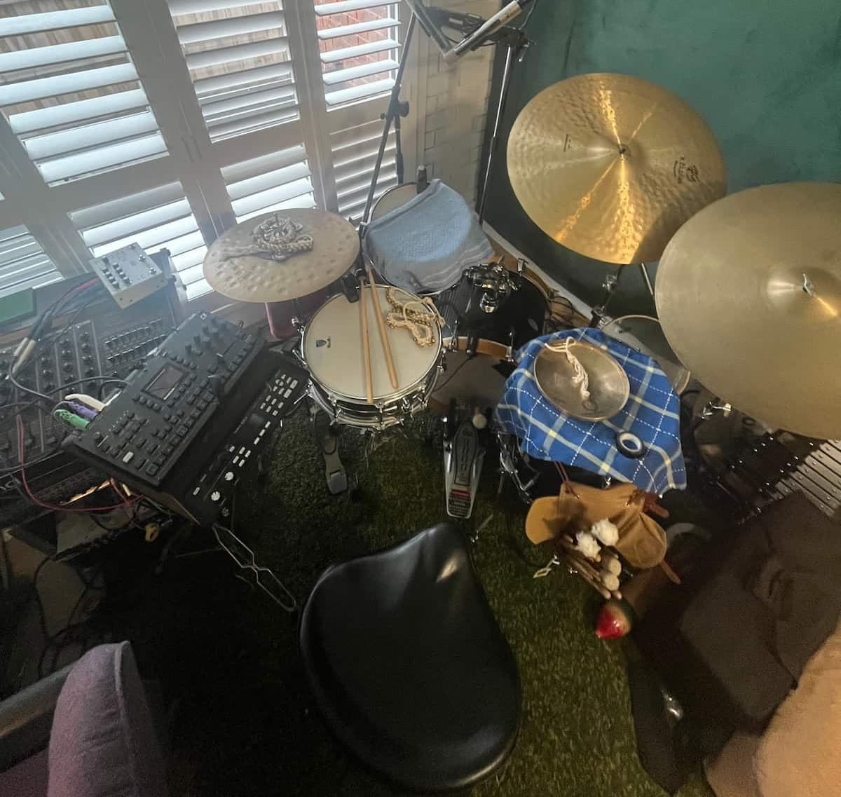 An overhead shot of the durms featuring Sensory Percussion on mesh heads, cymbals, and a Roland SPD-S