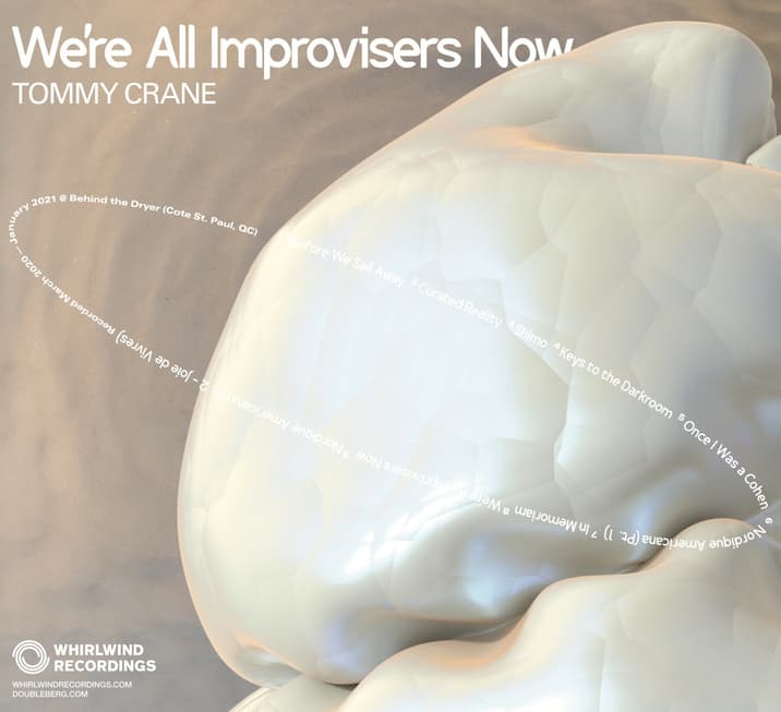 An image from the album art showing a close-up of a rock-like object with the track names superimposed in circle above it.