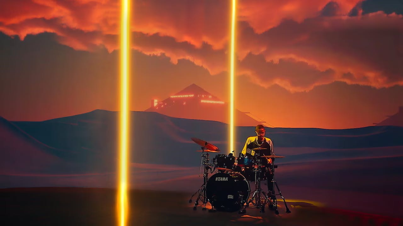 An image of Philo playing a drumkit in an imaginary world with beams of yellow light streaking toward the sky and a pyramid in the distance.